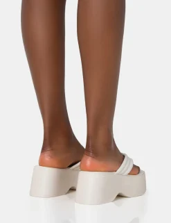 Public Desire Kiko Ecru Padded Flip Flop Strap Platform Sandals | Women Flatforms